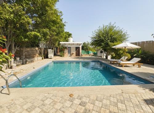 Πισίνα στο ή κοντά στο Radsum Luxury Farmhouse & Resort