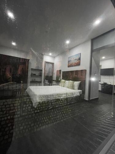 a large bedroom with two beds in a room at Căn hộ Đà Lạt Cảnh in Da Lat