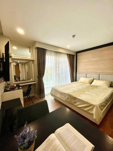 Ένα ή περισσότερα κρεβάτια σε δωμάτιο στο Centrally located cozy Studio