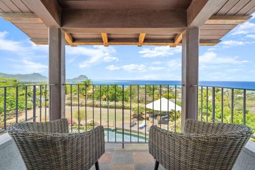 an ocean view from the porch of a villa at Domaine Harmonia - Group Retreat by Sealodge Mauritius in Rivière Noire