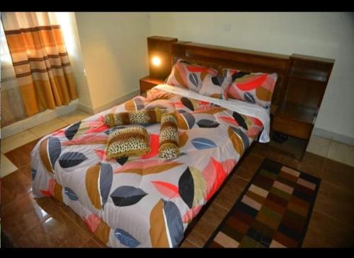 Ένα ή περισσότερα κρεβάτια σε δωμάτιο στο Pam Palatial Home