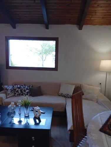 Ένα ή περισσότερα κρεβάτια σε δωμάτιο στο Οικια ΑΓΙΟΥ ΧΑΡΑΛΑΜΠΟΥ