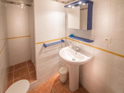 a bathroom with a sink and a toilet at Les bleuets in Bolquere Pyrenees 2000