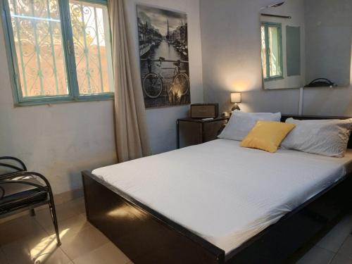 Postel nebo postele na pokoji v ubytování Cosy Studio