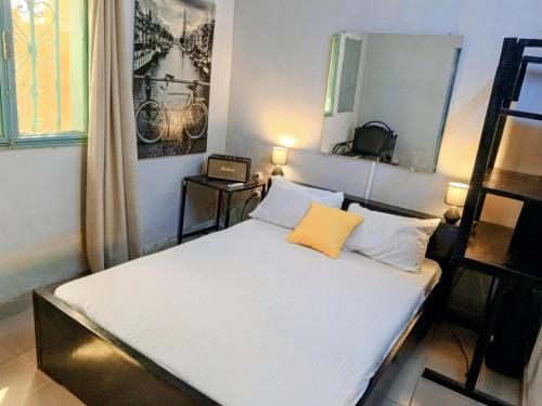 Postel nebo postele na pokoji v ubytování Cosy Studio