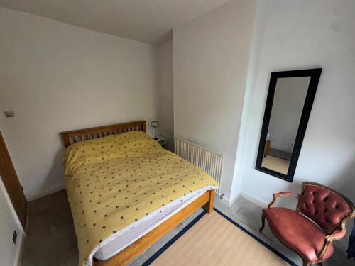 Ένα ή περισσότερα κρεβάτια σε δωμάτιο στο Commuters Getaway