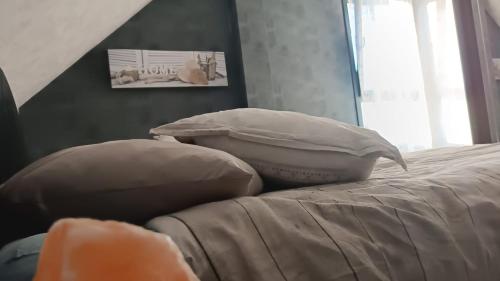 Postel nebo postele na pokoji v ubytování Le refuge d'Amma