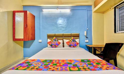 Postel nebo postele na pokoji v ubytování FabHotel SRH