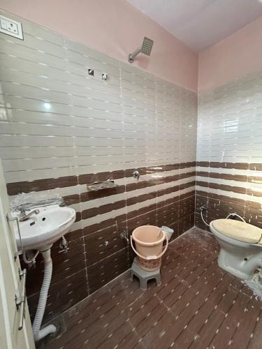 Ένα μπάνιο στο Gaurang Homestay