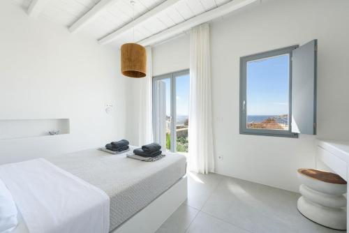 Ένα ή περισσότερα κρεβάτια σε δωμάτιο στο Prospect House Antiparos