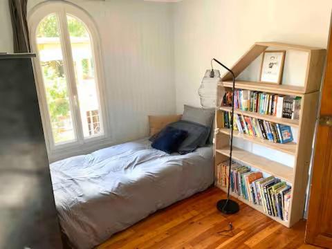 Postel nebo postele na pokoji v ubytování Maison Cocon de verdure - centre-ville - WIFI