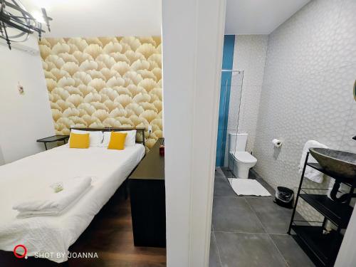 Postel nebo postele na pokoji v ubytování Royal Lux