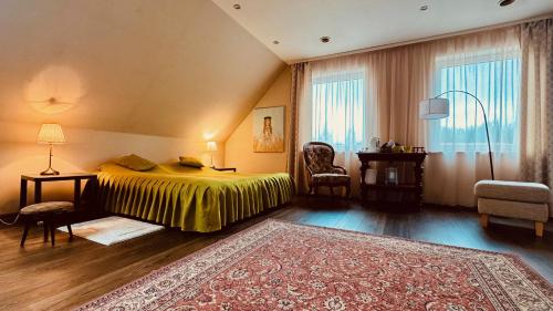 Ένα ή περισσότερα κρεβάτια σε δωμάτιο στο Brīvdienu māja Lielzemenes