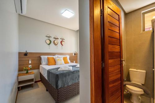 Ένα ή περισσότερα κρεβάτια σε δωμάτιο στο Conforto 5 Estrelas em Barra - 2 suítes!