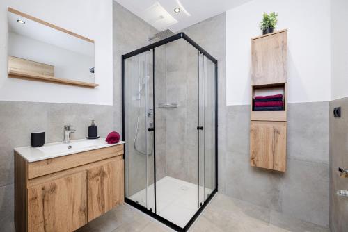 Ένα μπάνιο στο Ferienwohnung Persal