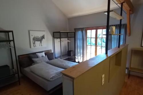Postel nebo postele na pokoji v ubytování NEU! Ferienwohnung Design 2 Wasserburger Land