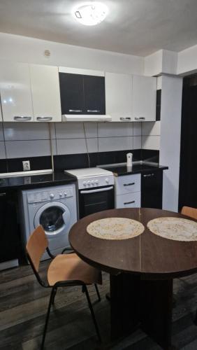 Kuchyň nebo kuchyňský kout v ubytování Apartament Vintage