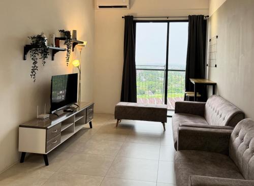 Μια τηλεόραση ή/και κέντρο ψυχαγωγίας στο Simple Stay Aston Acacia Bukit Mertajam