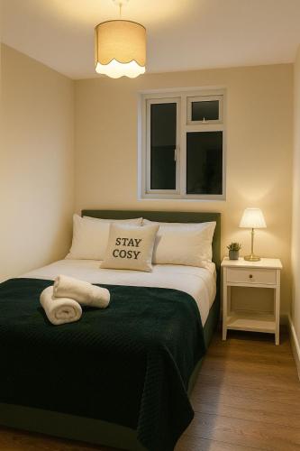 Ένα ή περισσότερα κρεβάτια σε δωμάτιο στο N15 Serenity Residence Elegant Rooms