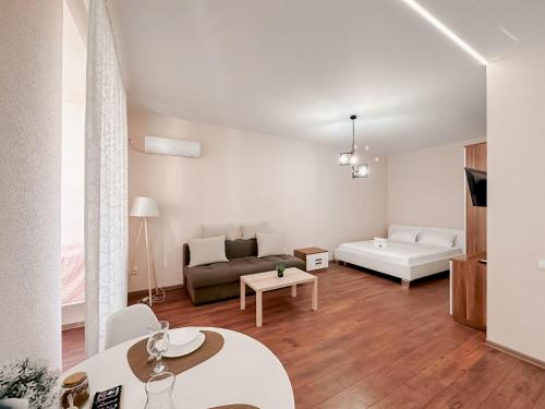 Postel nebo postele na pokoji v ubytování Жилой комплекс Ирина