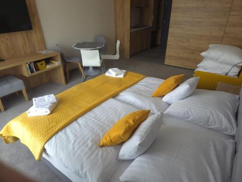 Ένα ή περισσότερα κρεβάτια σε δωμάτιο στο Apartament 319 Czarna Góra