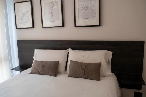 Ένα ή περισσότερα κρεβάτια σε δωμάτιο στο JC Apart Hotel Providencia