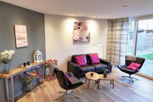 Posezení v ubytování Hello Zeeland - Oosterpark 108