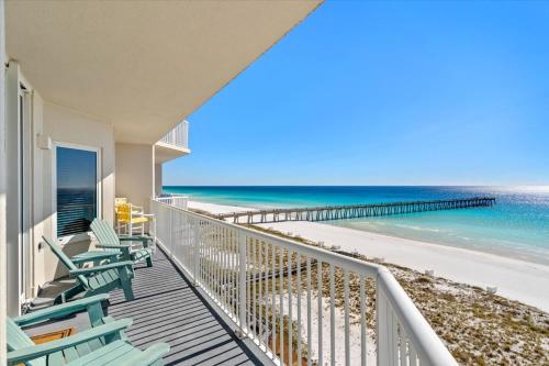 a balcony with chairs and the beach at Sea Esta condo in Navarre