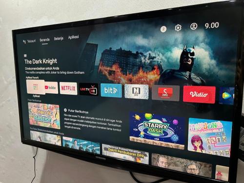 Μια τηλεόραση ή/και κέντρο ψυχαγωγίας στο Nagoya Mansion Residence with City View