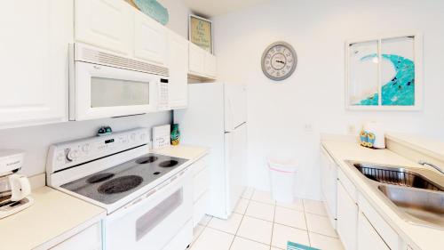 Kuchyň nebo kuchyňský kout v ubytování Royal Poste Unit 3209