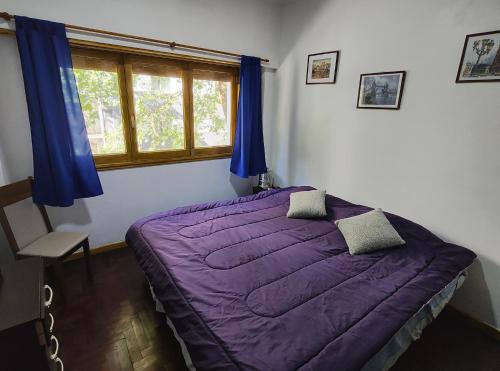 En eller flere senge i et værelse på Departamento céntrico