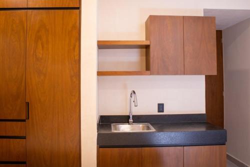 Kuchyň nebo kuchyňský kout v ubytování Native 5203 Lux 2BR Condo in Tulum