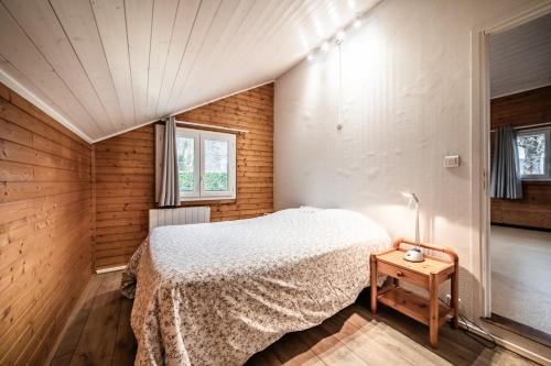 Postel nebo postele na pokoji v ubytování Petit chalet proche Lac Léman