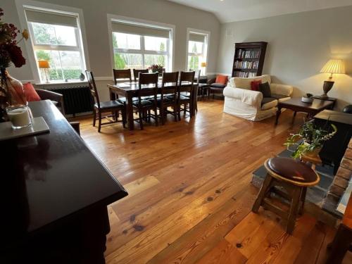 a living room with a table and chairs at Hillview House, Donegal Town in Donegal