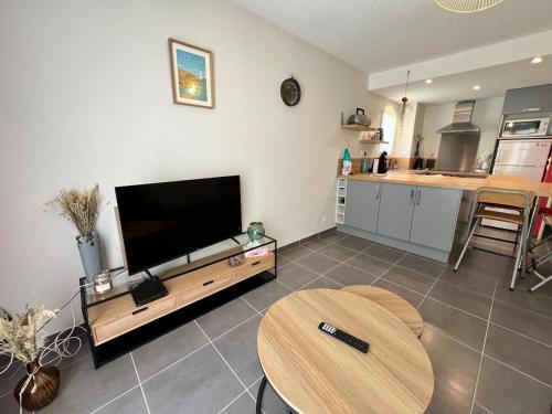 Kuchyň nebo kuchyňský kout v ubytování Proche centre-ville joli appartement 2p