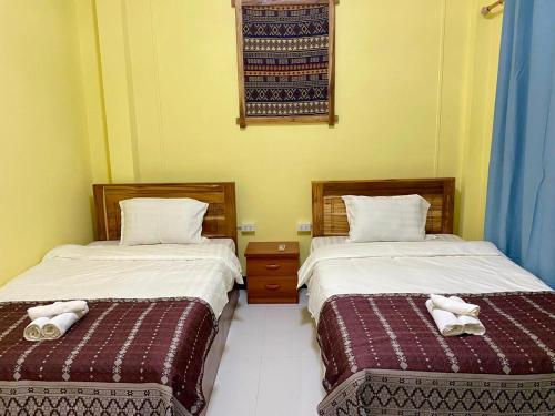 Postel nebo postele na pokoji v ubytování Meet Sunset Villa Luang Prabang