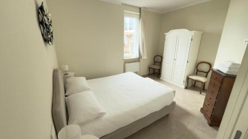 Ένα ή περισσότερα κρεβάτια σε δωμάτιο στο I Rioni di Perugia