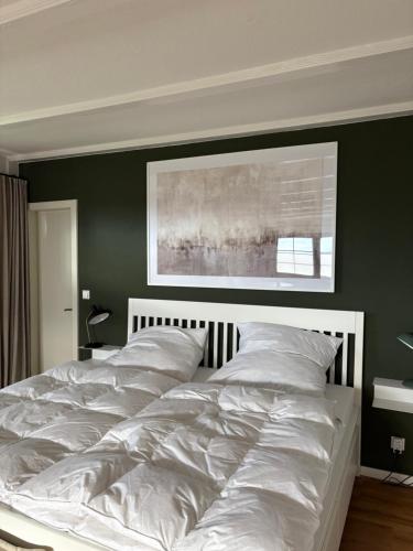 Postel nebo postele na pokoji v ubytování Ferienwohnung auf dem Weingut am Klotz