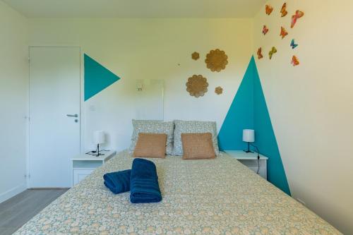 Ένα ή περισσότερα κρεβάτια σε δωμάτιο στο Maison Tulipe 3Ch