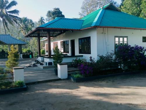 Aed väljaspool majutusasutust Wayanad Campaign Parudeesa