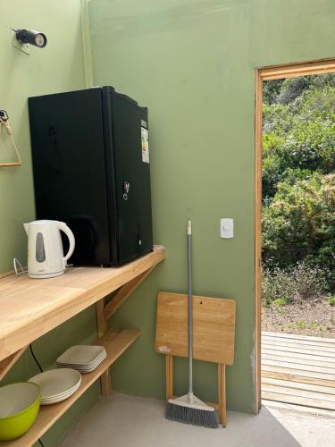 Kuchyň nebo kuchyňský kout v ubytování Glamping Tunquén