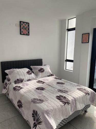 Postel nebo postele na pokoji v ubytování Hostal Marina