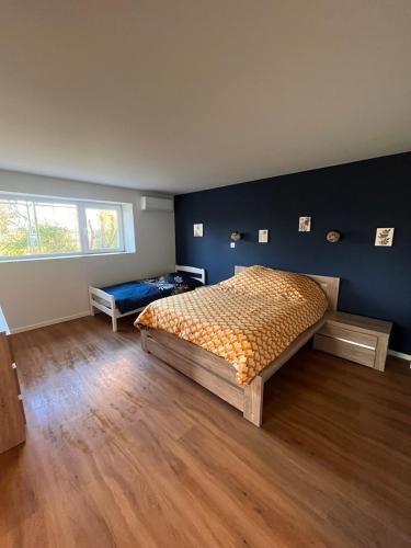 Ένα ή περισσότερα κρεβάτια σε δωμάτιο στο Appartement meublé