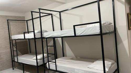 Postel nebo postele na pokoji v ubytování Studio 51 residence