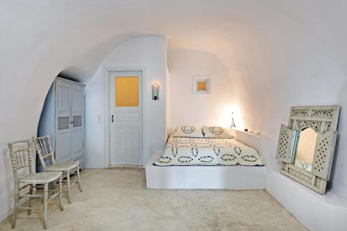 Postel nebo postele na pokoji v ubytování VILLA KALLISTI -Volcano View