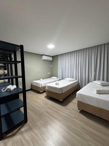 Postel nebo postele na pokoji v ubytování Casa Rede Vila