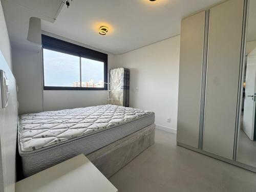 Postel nebo postele na pokoji v ubytování Oásis do Atlântico Home Clube - Apto 307 A para 4 pessoas com vista do mar