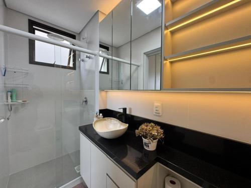 Koupelna v ubytování Oásis do Atlântico Home Clube - Apto 307 A para 4 pessoas com vista do mar