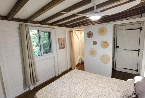 Ένα ή περισσότερα κρεβάτια σε δωμάτιο στο Kaz Coco Bungalow