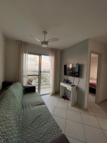 Postel nebo postele na pokoji v ubytování Quarto em Guarapari